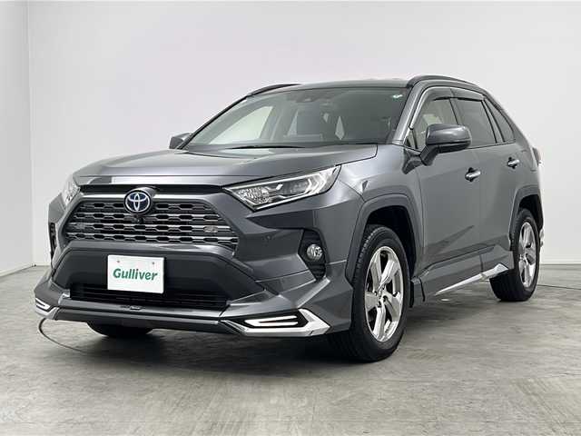 トヨタ ＲＡＶ４ ハイブリットG 三重県 2021(令3)年 7.7万km グレーメタリック 禁煙車/純正ディスプレイオーディオ/・フルセグ・Bluetooth・USB・MiraCast/パノラミックビューモニター/モデリスタフルエアロ/ブラインドスポットモニター/トヨタセーフティセンス/・プリクラッシュセーフティ/・オートマチックハイビーム/・レーントレーシングアシスト/・ロードサインアシスト/・レーダクルーズコントロール/パワーバックドア/ステアリングヒーター/ルーフレール/前席シートヒーター/運転席パワーシート（メモリ付き）/LEDヘッドライト（オート）/ビルトインETC/スペアタイヤ/電子パーキング/パーキングサポートブレーキ/置くだけ充電