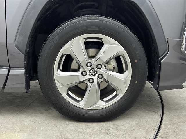 トヨタ ＲＡＶ４ ハイブリットG 三重県 2021(令3)年 7.7万km グレーメタリック 禁煙車/純正ディスプレイオーディオ/・フルセグ・Bluetooth・USB・MiraCast/パノラミックビューモニター/モデリスタフルエアロ/ブラインドスポットモニター/トヨタセーフティセンス/・プリクラッシュセーフティ/・オートマチックハイビーム/・レーントレーシングアシスト/・ロードサインアシスト/・レーダクルーズコントロール/パワーバックドア/ステアリングヒーター/ルーフレール/前席シートヒーター/運転席パワーシート（メモリ付き）/LEDヘッドライト（オート）/ビルトインETC/スペアタイヤ/電子パーキング/パーキングサポートブレーキ/置くだけ充電