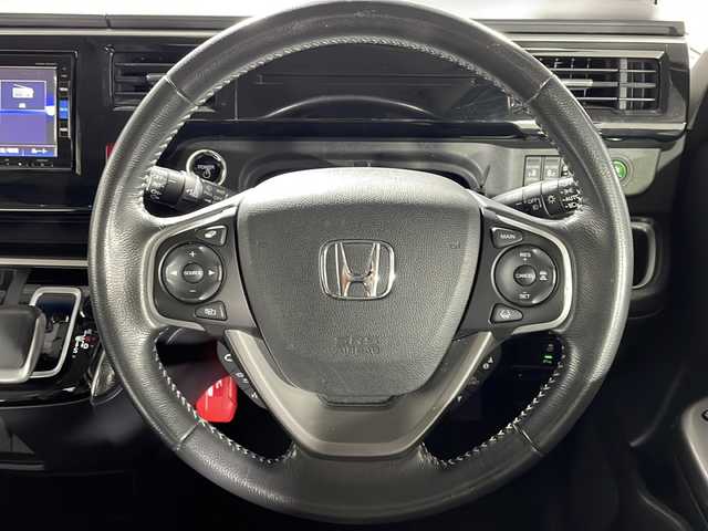 ホンダ ステップワゴン スパーダ ハイブリッド G ホンダセンシング 沖縄県 2019(平31)年 2.5万km モダンスティールM 禁煙車/両側パワースライド/純正７インチナビ/・ＣＤ／ＤＶＤ／Ｂｌｕｅｔｏｏｔｈ／フルセグＴＶ　/両側パワースライド/マルチビューカメラ/純正１６インチアルミ/ビルトインＥＴＣ/ドライブレコーダー前後/ホンダセンシング/●衝突軽減ブレーキ/●誤発進抑制機能/●歩行者事故低減ステアリング/●路外逸脱抑制機能/●アダプティブ・クルーズ・コントロール/●車線維持支援システム/●先行車発進お知らせ機能/●標識認識機能/保証書/取扱説明書