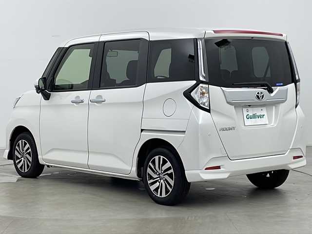 トヨタ ルーミー カスタムG 福島県 2023(令5)年 0.8万km パールホワイトⅢ ・４WD/・寒冷地仕様/・社外ナビ（AVN-LBS01）/・Bluetooth/・バックカメラ/・両側パワースライドドア/・スマートアシスト/・先行車発進お知らせ/・衝突被害軽減ブレーキ/・車線逸脱警報/・標識認識機能/・ふらつき警報/・プッシュスタート/・スマートキー/・フロントワイパーデアイサー/・車速連動間欠ワイパー/・クルーズコントロール/・クリアランスソナー/・ETC/・電動パーキングブレーキ/・ミラーヒーター/・オートマチックハイビーム/・LEDヘッドライト/・アイドリングストップ/・革巻きステアリング/・横滑り防止装置/・オートライト