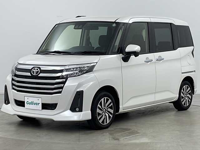 トヨタ ルーミー カスタムG 福島県 2023(令5)年 0.8万km パールホワイトⅢ ・４WD/・寒冷地仕様/・社外ナビ（AVN-LBS01）/・Bluetooth/・バックカメラ/・両側パワースライドドア/・スマートアシスト/・先行車発進お知らせ/・衝突被害軽減ブレーキ/・車線逸脱警報/・標識認識機能/・ふらつき警報/・プッシュスタート/・スマートキー/・フロントワイパーデアイサー/・車速連動間欠ワイパー/・クルーズコントロール/・クリアランスソナー/・ETC/・電動パーキングブレーキ/・ミラーヒーター/・オートマチックハイビーム/・LEDヘッドライト/・アイドリングストップ/・革巻きステアリング/・横滑り防止装置/・オートライト