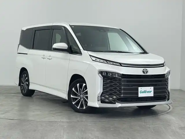 トヨタ ヴォクシー S－Z 群馬県 2024(令6)年 1.5万km ホワイトパールクリスタルシャイン 快適利便パッケージ　純正10.5型ナビ　バックカメラ　アダプティブクルーズコントロール　両側電動スライドドア　電動リアゲート　純正ビルトインETC2.0 オットマン　デジタルミラー一体型ドラレコ　禁煙