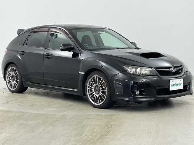 スバル インプレッサ ＷＲＸ STi 道央・札幌 2010(平22)年 11.5万km オブシディアンブラックパール ・４ＷＤ/・社外ナビ＆ＴＶ＆ＤＶＤ＆ＣＤ/・ＳＩ－ＤＲＩＶＥ/・Ｃ－ＤＩＦＦ/・ＳＴＩ１８インチアルミ/・追加補器メーター（ブースト計他）/・社外ＥＴＣ/・ハーフレザーシート/・キセノンヘッドライト/・横滑り防止装置
