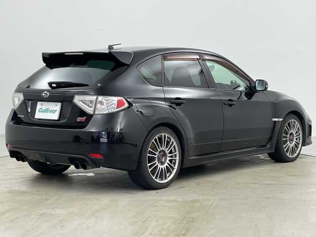 スバル インプレッサ ＷＲＸ STi 道央・札幌 2010(平22)年 11.5万km オブシディアンブラックパール ・４ＷＤ/・社外ナビ＆ＴＶ＆ＤＶＤ＆ＣＤ/・ＳＩ－ＤＲＩＶＥ/・Ｃ－ＤＩＦＦ/・ＳＴＩ１８インチアルミ/・追加補器メーター（ブースト計他）/・社外ＥＴＣ/・ハーフレザーシート/・キセノンヘッドライト/・横滑り防止装置