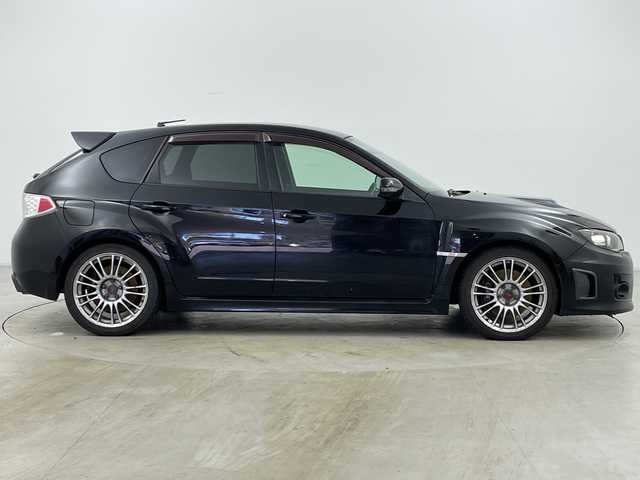 スバル インプレッサ ＷＲＸ STi 道央・札幌 2010(平22)年 11.5万km オブシディアンブラックパール ・４ＷＤ/・社外ナビ＆ＴＶ＆ＤＶＤ＆ＣＤ/・ＳＩ－ＤＲＩＶＥ/・Ｃ－ＤＩＦＦ/・ＳＴＩ１８インチアルミ/・追加補器メーター（ブースト計他）/・社外ＥＴＣ/・ハーフレザーシート/・キセノンヘッドライト/・横滑り防止装置