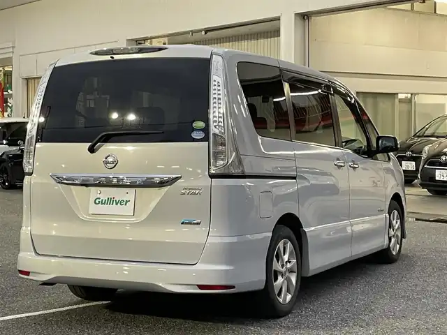 日産 セレナ ハイウェイスター Sハイブリッド 千葉県 2013(平25)年 10.5万km エターナルスノーホワイト 社外ナビ(AM/FM/CD/DVD/BT/フルセグ)/社外10.2インチフリップダウンモニター(PCX-R3300)/両側パワースライドドア/バックカメラ/ETC/オートライト/バイザー/純正マット/取説・保証書