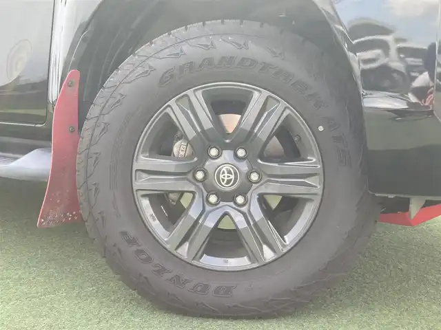 トヨタ ハイラックス Z 香川県 2021(令3)年 5.9万km アティチュードブラックマイカ 登録時走行距離：58802km/アルパイン11型フローティングナビ/　CD DVD BT フルセグTV/バックカメラ/スポーツバー/マッドガード/プリクラッシュセーフティシステム/レーンキープアシスト/レーダークルーズコントロール/ダウンヒルアシストコントロール/LEDヘッドライト/オートライト/フォグランプ/リアフォグ/アイドリングストップ/横滑り防止装置/MTモード付AT/革巻きステアリング/ステアリングスイッチ/プッシュスタート/スマートキー/4WD/ターボ