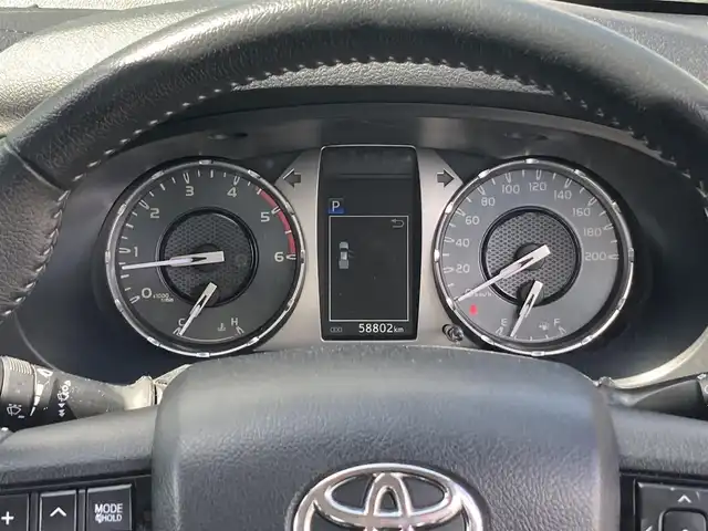 トヨタ ハイラックス Z 香川県 2021(令3)年 5.9万km アティチュードブラックマイカ 登録時走行距離：58802km/アルパイン11型フローティングナビ/　CD DVD BT フルセグTV/バックカメラ/スポーツバー/マッドガード/プリクラッシュセーフティシステム/レーンキープアシスト/レーダークルーズコントロール/ダウンヒルアシストコントロール/LEDヘッドライト/オートライト/フォグランプ/リアフォグ/アイドリングストップ/横滑り防止装置/MTモード付AT/革巻きステアリング/ステアリングスイッチ/プッシュスタート/スマートキー/4WD/ターボ