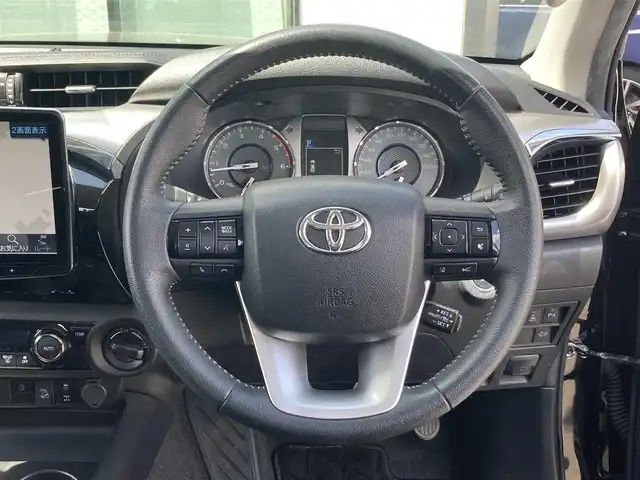 トヨタ ハイラックス Z 香川県 2021(令3)年 5.9万km アティチュードブラックマイカ 登録時走行距離：58802km/アルパイン11型フローティングナビ/　CD DVD BT フルセグTV/バックカメラ/スポーツバー/マッドガード/プリクラッシュセーフティシステム/レーンキープアシスト/レーダークルーズコントロール/ダウンヒルアシストコントロール/LEDヘッドライト/オートライト/フォグランプ/リアフォグ/アイドリングストップ/横滑り防止装置/MTモード付AT/革巻きステアリング/ステアリングスイッチ/プッシュスタート/スマートキー/4WD/ターボ