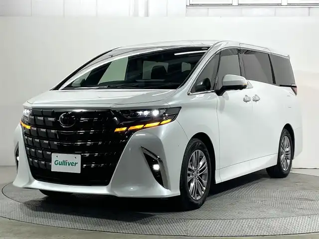 トヨタ アルファード Z 大阪府 2025(令7)年 0.4万km プラチナホワイトパールマイカ 後席モニター　デジタルインナーミラー　全方位カメラ　純正大型ナビＴＶ　黒革シート　パークアシスト　シートヒーター／エアコン　パワーシート　ハンドルヒーター　ＥＴＣ　ワイヤレス充電　ＢＳＭ　両側パワスラ