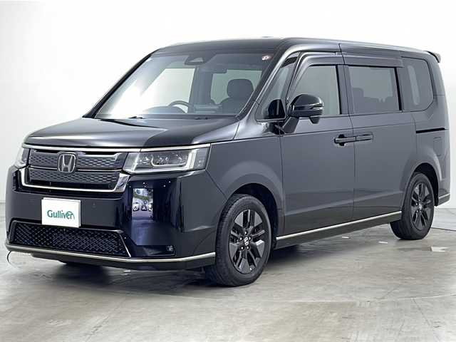 ホンダ ステップワゴン スパーダ 道央・札幌 2023(令5)年 2.1万km クリスタルブラックパール ・ワンオーナー/・４WD/・寒冷地仕様/・純正ナビ（LXM-237VFLi）/・Bluetooth/CD/DVD/HDMI/フルセグTV/・純正フリップダウンモニター/・バックカメラ/・両側パワースライドドア/・アダプティブクルーズコントロール/・ホンダセンシング/・衝突被害軽減ブレーキ/・踏み間違い軽減/・路外逸脱警報/・先行車発進お知らせ/・標識認識機能/・ブラインドスポットモニター/・パワーバックドア/・LEDヘッドライト/・オートライト/・オートマチックハイビーム/・前席シートヒーター/・ハーフレザーシート/・プッシュスタート/・スマートキー/・パドルシフト/・電動パーキング/・ウォークスルー/・革巻きステアリング/・ヘッドライトリベライザー/・ECON/・横滑り防止装置/・アイドリングストップ
