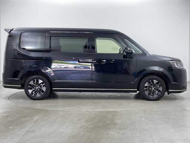 ホンダ ステップワゴン スパーダ 道央・札幌 2023(令5)年 2.1万km クリスタルブラックパール ・ワンオーナー/・４WD/・寒冷地仕様/・純正ナビ（LXM-237VFLi）/・Bluetooth/CD/DVD/HDMI/フルセグTV/・純正フリップダウンモニター/・バックカメラ/・両側パワースライドドア/・アダプティブクルーズコントロール/・ホンダセンシング/・衝突被害軽減ブレーキ/・踏み間違い軽減/・路外逸脱警報/・先行車発進お知らせ/・標識認識機能/・ブラインドスポットモニター/・パワーバックドア/・LEDヘッドライト/・オートライト/・オートマチックハイビーム/・前席シートヒーター/・ハーフレザーシート/・プッシュスタート/・スマートキー/・パドルシフト/・電動パーキング/・ウォークスルー/・革巻きステアリング/・ヘッドライトリベライザー/・ECON/・横滑り防止装置/・アイドリングストップ