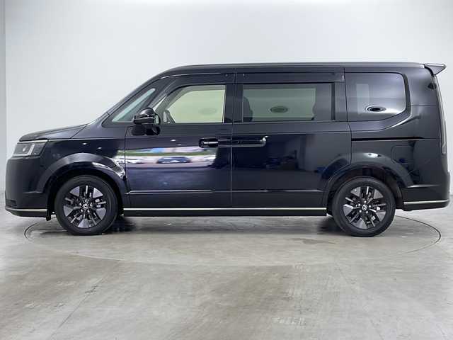 ホンダ ステップワゴン スパーダ 道央・札幌 2023(令5)年 2.1万km クリスタルブラックパール ・ワンオーナー/・４WD/・寒冷地仕様/・純正ナビ（LXM-237VFLi）/・Bluetooth/CD/DVD/HDMI/フルセグTV/・純正フリップダウンモニター/・バックカメラ/・両側パワースライドドア/・アダプティブクルーズコントロール/・ホンダセンシング/・衝突被害軽減ブレーキ/・踏み間違い軽減/・路外逸脱警報/・先行車発進お知らせ/・標識認識機能/・ブラインドスポットモニター/・パワーバックドア/・LEDヘッドライト/・オートライト/・オートマチックハイビーム/・前席シートヒーター/・ハーフレザーシート/・プッシュスタート/・スマートキー/・パドルシフト/・電動パーキング/・ウォークスルー/・革巻きステアリング/・ヘッドライトリベライザー/・ECON/・横滑り防止装置/・アイドリングストップ