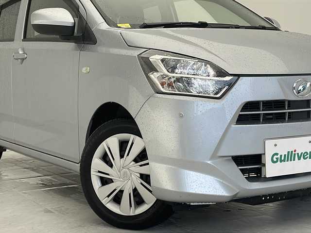 ダイハツ ミラ イース X SAⅢ 沖縄県 2021(令3)年 5.5万km ブライトシルバーメタリック 純正オーディオ　/（ＣＤ　ＡＵＸ）　/ＥＴＣ　/前後コーナーセンサー　/アイドリングストップ　/電動格納ミラー　/ドアバイザー　/ＬＥＤヘッドライト　/オートライト　/純正フロアマット　/ヘッドライトレベライザー