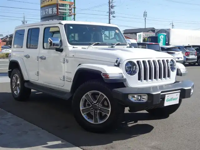 クライスラー・ジープ ジープ ラングラー アンリミテッド サハラ 静岡県 2020(令2)年 8.6万km 白 禁煙車/車検R9年5月28日/パートタイム4WD/BSM/リアクロスパスディテクション/パークアシスト（フロント／リア）/メーカー純正ナビ/　AM.FM/BT/USB/AUX/フルセグTV/フロント／バックカメラ/ETC/社外前後ドライブレコーダー/アルパインスピーカー/マルチディスプレイ/ブラックレザーシート/前席シートヒーター/ステアリングヒーター/後席AC電源（150W）/プッシュスタート／スマートキー/各種メッキパーツ/LEDヘッドライト/背面タイヤ（カバー付）/純正フロアマット/取扱説明書／保証書