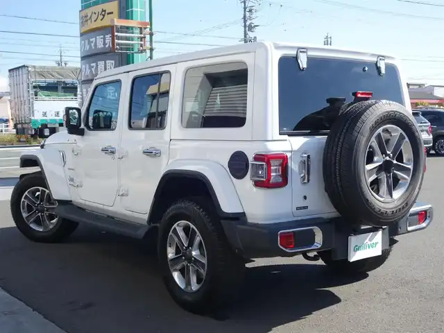 クライスラー・ジープ ジープ ラングラー アンリミテッド サハラ 静岡県 2020(令2)年 8.6万km 白 禁煙車/車検R9年5月28日/パートタイム4WD/BSM/リアクロスパスディテクション/パークアシスト（フロント／リア）/メーカー純正ナビ/　AM.FM/BT/USB/AUX/フルセグTV/フロント／バックカメラ/ETC/社外前後ドライブレコーダー/アルパインスピーカー/マルチディスプレイ/ブラックレザーシート/前席シートヒーター/ステアリングヒーター/後席AC電源（150W）/プッシュスタート／スマートキー/各種メッキパーツ/LEDヘッドライト/背面タイヤ（カバー付）/純正フロアマット/取扱説明書／保証書