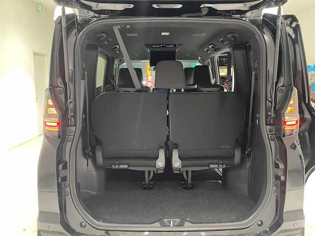 トヨタ ヴォクシー ハイブリッド S－Z 宮城県 2023(令5)年 5.4万km アティチュードブラックマイカ トヨタセーフティセンス/・プリクラッシュセーフティ/・レーンチェンジアシスト/・レーントレーシングアシスト/・レーンディパーチャーアラート/・レーダークルーズコントロール/・オートマチックハイビーム/・ロードサインアシスト/・プロアクティブドライビングアシスト/ブラインドスポットモニター/純正10.5インチディスプレイオーディオ/・バックカメラ/・フルセグTV/Bluetooth/CD/DVD/・HDMI/Miracast/・ビルトインETC2.0/・社外前後ドライブレコーダー/純正13.2型有機EL後席ディスプレイ/ユニバーサルステップ/前後コーナーセンサー/電子パーキング/・オートブレーキホールド/100V充電/革巻きステアリング/・ステアリングリモコン/ハーフレザーシート/・シートヒーター（運転席/助手席）/・ウォークスルー/三眼LEDヘッドライト/・オートライト/・フォグランプ/プッシュスタート/・スマートキー/純正アルミホイール/純正フロアマット/ドアバイザー