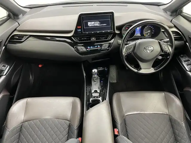 トヨタ Ｃ－ＨＲ ハイブリッド 1．8G 熊本県 2017(平29)年 6.5万km ブラックマイカ モデリスタエアロ【前・横・後】/純正9インチSDナビ（NSZT-Y66T）/【CD/DVD/BT/フルセグ】　/レーダークルーズコントロール　/シートヒーター前席　/ＥＴＣ　/バックカメラ　/ドライブレコーダー/ブラインドスポットモニター/コーナーセンサー前後/スペアキー×1/LEDヘッドライト/オートライト/オートハイビーム/オートブレーキホールド/ISOFIX/ステアリングスイッチ/ドアバイザー/アイドリングストップ/新車保証書/取扱説明書/スペアキー×1