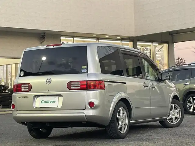 日産 ラフェスタ 20G 宮城県 2009(平21)年 7.8万km ダイヤモンドシルバー ワンオーナー/純正ナビ（CD戻り不良）/サンルーフ/バックカメラ/左パワースライドドア/オートライト/スペアキー×1　/純正ドアバイザー/純正ETC/純正フロアカーペット　/鉄チンサマータイヤ溝無し/(195/60R15)