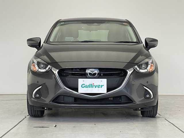 マツダ デミオ 15Sツーリング 愛知県 2018(平30)年 2.4万km マシーングレープレミアムM 純正ナビ　SDカードなし/全方位カメラ/クルーズコントロール/シートヒーター/バックカメラ/ヘッドアップディスプレイ/コーナーセンサー/純正アルミホイール/ブラインドスポットモニター/LEDヘッドライト/オートマチックハイビーム/ドライブレコーダー/ETC/ワンセグ/CD DVD/Bluetooth/ステアリングスイッチ/スマートキー/プッシュスタート