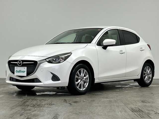 マツダ デミオ 13S Lパッケージ 三重県 2015(平27)年 4.4万km スノーフレイクホワイトパールマイカ /禁煙車//マツダコネクトナビ//スマートシティブレーキサポート//衝突軽減ブレーキ//レーンキープアシスト//ブラインドスポットモニター//ヘッドアップディスプレイ//バックカメラ//純正ビルトインETC//ステアリングスイッチ//オートライト//オートハイビーム//LED//サイドカーテンエアバッグ//ハーフレザーシート