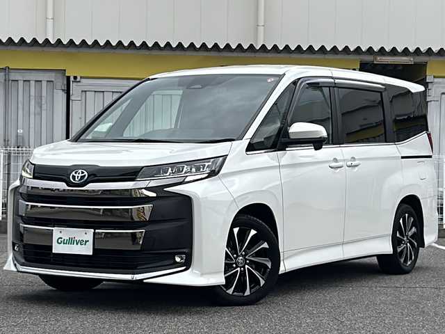 トヨタ ノア ハイブリッド S－Z 愛知県 2023(令5)年 1.6万km ホワイトパールクリスタルシャイン /ワンオーナー//純正メモリナビ//純正フルセグTV//CD/DVD/BT/USB/FM/AM//バックカメラ//ビルトインETC2.0//前後ドライブレコーダー//純正フリップダウン後席モニター//デジタルインナーミラー//AC100V//ヘッドアップディスプレイ//電動パーキングブレーキ//オートブレーキホールドスイッチ//Toyota Safety Sense//追従機能付きクルーズコントロール//プリクラッシュセーフティ//レーンアシスト//オートマチックハイビーム//横滑り防止装置//テレビキャンセラー//DRIVE/EV MODE//ステアスイッチ//補助確認装置//純正LEDオートライト//フロントフォグランプ//オートリトラミラー//ドアバイザー//両側パワースライドドア//シートヒーター(D/N)//ダブル/サイド/カーテンエアバック//スマートキー//スペアキー1本//取扱説明書//ナビ説明書//保証書