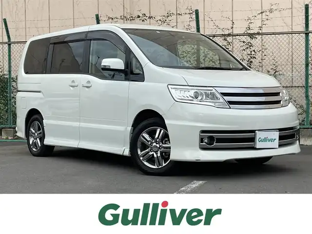 日産 セレナ ライダー ハイパフォーマンス 東京都 2009(平21)年 5.8万km ホワイトパール 純正ナビ/Bluetooth/テレビ/CDプレイヤー/DVD/MSV/ETC/バックカメラ/純正後席モニター/スマートキー/スペアキー/ドライブレコーダー/片側パワースライドドア/純正フロアマット/HIDヘッドライト/オートライト/純正サイドバイザー/ウィンカーミラー/ミラー型GPS（AR-915MT）