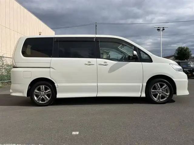 日産 セレナ ライダー ハイパフォーマンス 東京都 2009(平21)年 5.8万km ホワイトパール 純正ナビ/Bluetooth/テレビ/CDプレイヤー/DVD/MSV/ETC/バックカメラ/純正後席モニター/スマートキー/スペアキー/ドライブレコーダー/片側パワースライドドア/純正フロアマット/HIDヘッドライト/オートライト/純正サイドバイザー/ウィンカーミラー/ミラー型GPS（AR-915MT）