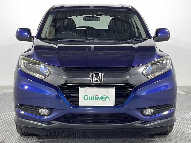 ホンダ ヴェゼル ハイブリッド X 広島県 2015(平27)年 7万km モルフォブルーP 禁煙車/純正ナビ/バックカメラ/クルーズコントロール/ＥＴＣ/衝突被害軽減/レーンキープアシスト/ＬＥＤヘッドライト/フォグランプ/スマートキー/パドルシフト/オートマチックブレーキホールド/純正アルミホイール(215/60/R16)/エアバッグ(運転席/助手席/サイド/カーテン)