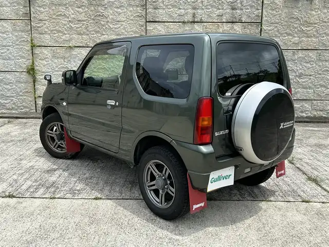 スズキ ジムニー ランドベンチャー 長崎県 2017(平29)年 8.5万km クールカーキPM ワンオーナー/社外メモリナビ/(CD/DVD/BT/フルセグ)/バックカメラ/レザーシート/シートヒーター/フォグランプ/マッドガード/ETC/ステアリングスイッチ/電動格納ミラー/ドアバイザー