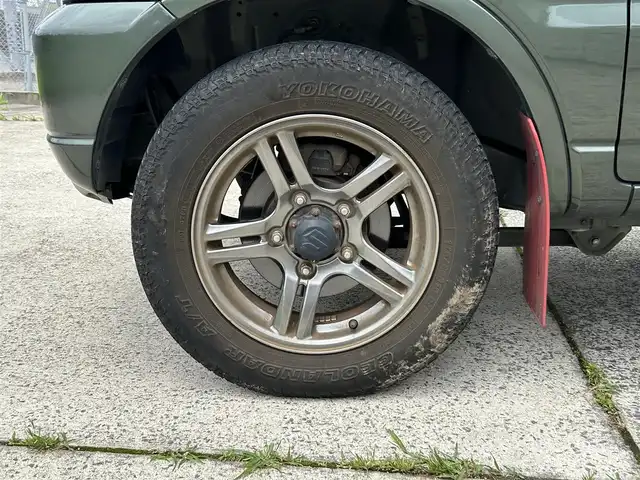 スズキ ジムニー ランドベンチャー 長崎県 2017(平29)年 8.5万km クールカーキPM ワンオーナー/社外メモリナビ/(CD/DVD/BT/フルセグ)/バックカメラ/レザーシート/シートヒーター/フォグランプ/マッドガード/ETC/ステアリングスイッチ/電動格納ミラー/ドアバイザー