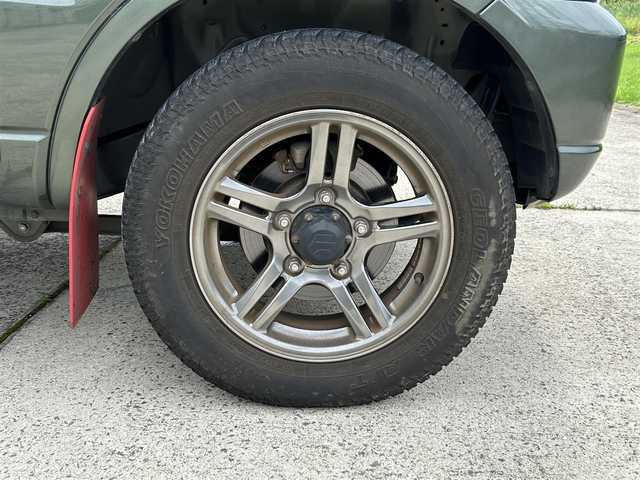 スズキ ジムニー ランドベンチャー 長崎県 2017(平29)年 8.5万km クールカーキPM ワンオーナー/社外メモリナビ/(CD/DVD/BT/フルセグ)/バックカメラ/レザーシート/シートヒーター/フォグランプ/マッドガード/ETC/ステアリングスイッチ/電動格納ミラー/ドアバイザー