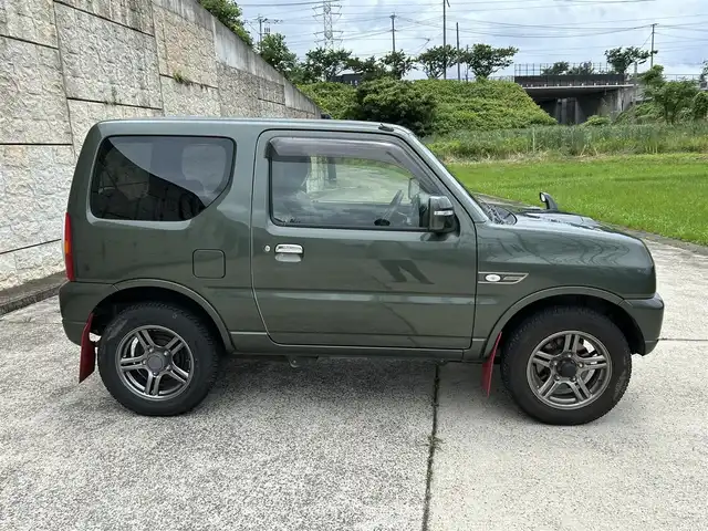 スズキ ジムニー ランドベンチャー 長崎県 2017(平29)年 8.5万km クールカーキPM ワンオーナー/社外メモリナビ/(CD/DVD/BT/フルセグ)/バックカメラ/レザーシート/シートヒーター/フォグランプ/マッドガード/ETC/ステアリングスイッチ/電動格納ミラー/ドアバイザー