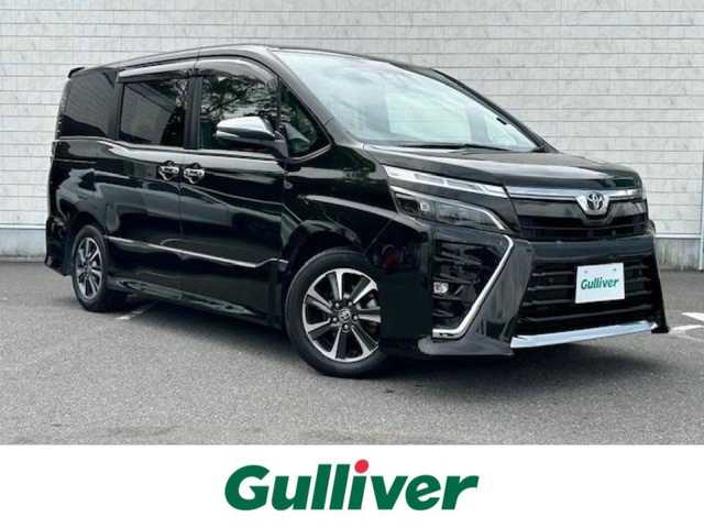 トヨタ ヴォクシー ZS 煌Ⅲ 大阪府 2021(令3)年 6.1万km イナズマスパーキングブラックガラスフレーク １０インチナビ　/フルセグ　/Ｂｌｕｅｔｏｏｔｈ　/バックカメラ　/フリップダウンモニター　/両側パワースライドドア　/ＨＤＭＩ　/クルーズコントロール　/前後ドラレコ　/前後コーナーセンサー　/ＥＴＣ　/フロアーマット