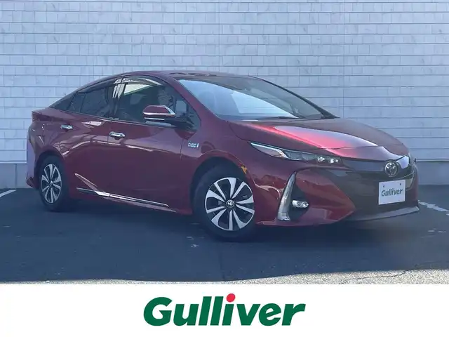 トヨタ プリウス ＰＨＶ A プレミアム 愛知県 2018(平30)年 3万km エモーショナルレッド ・純正11.6インチTコネクトメモリーナビ/・フルセグテレビ/・Bluetooth/USB/AUX接続機能/・ETC2.0/・本革シート/・パワーシート（運転席）/・純正フロアマット/・純正15インチアルミホイール/・純正LEDヘッドライト/・オートマチックハイビーム/・ヘッドアップディスプレイ/・衝突軽減ブレーキ/・レーンキープアシスト/・ブラインドスポットモニター/・アダプティブクルーズコントロール/・パーキングアシスト/・純正ドライブレコーダー