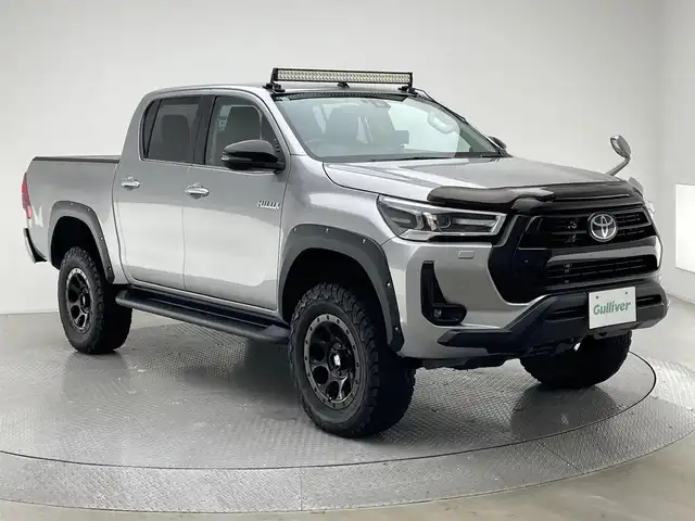 トヨタ ハイラックス Z 兵庫県 2021(令3)年 4.1万km シルバーメタリック 社外SDナビ/(CN-RE07WD)/フルセグ CD DVD BT MSV/バックカメラ/社外フロント・サイドカメラ/プラターライナー塗装/リフトアップ/ETC/バックフリップトノカバー/コーナーセンサー/レーダークルーズコントロール/プリクラッシュセーフティー/RSA/LDA/シートカバー/社外17インチアルミホイール/社外フロアマット/社外バグガード/LEDヘッドライト/LEDフォグライト/オートライト/アイドリングストップ/スマートキー