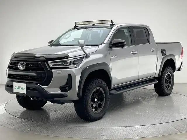 トヨタ ハイラックス Z 兵庫県 2021(令3)年 4.1万km シルバーメタリック 社外SDナビ/(CN-RE07WD)/フルセグ CD DVD BT MSV/バックカメラ/社外フロント・サイドカメラ/プラターライナー塗装/リフトアップ/ETC/バックフリップトノカバー/コーナーセンサー/レーダークルーズコントロール/プリクラッシュセーフティー/RSA/LDA/シートカバー/社外17インチアルミホイール/社外フロアマット/社外バグガード/LEDヘッドライト/LEDフォグライト/オートライト/アイドリングストップ/スマートキー