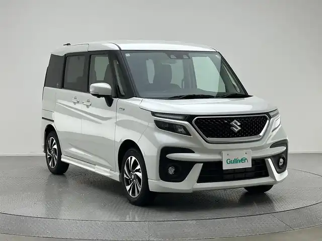 スズキ ソリオ バンディット HV MV 兵庫県 2024(令6)年 0.1万km未満 パール 登録済未使用車/デュアルカメラブレーキサポート/全方位モニター用カメラパッケージ/レーダークルーズコントロール/レーンキープアシスト/コーナーセンサー/両側パワースライドドア/ヘッドアップディスプレイ/LEDヘッドライト/オートライト/オートハイビーム/ステアリングリモコン/アイドリングストップ/シートヒーター/スマートキー/スペアキー/取扱い説明書/新車時保証書