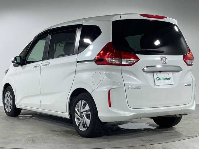ホンダ フリード ハイブリット G 福岡県 2023(令5)年 3.5万km プラチナホワイトパール 純正7インチSDナビ【VXM-234VFi】/【AM/FM/CD/DVD/Bluetooth/フルセグTV】/バックカメラ/ETC2.0/追従型クルーズコントロール/衝突軽減システム/前後コーナーセンサー/両側電動パワースライドドア/純正フロアマット/LEDヘッドライト/スマートキー/スペアキー×1
