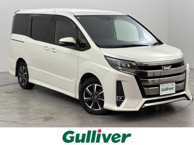 トヨタ ノア Si 福岡県 2017(平29)年 8.3万km ラグジュアリーホワイトパールクリスタルシャインガラスフレーク 後席モニター　/純正９インチナビ　/バックカメラ　/ＥＴＣ　/クルーズコントロール　/コーナーセンサー　/衝突軽減ブレーキ　/レーンキープ　/先行者発進告知　/ＭＴモード付ＡＴ　/片側電動スライドドア　/純正１６インチＡＷ