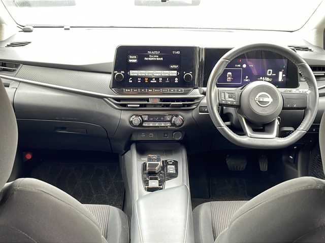 日産 ノート X FOUR 長野県 2021(令3)年 2.2万km ピュアホワイトパール 禁煙車/純正9インチナビ（フルセグTV/Bluetooth/USB）/インテリジェントアラウンドビューモニター/インテリジェントルームミラー/・インテリジェントエマージェンシーブレーキ/・踏み間違い衝突防止アシスト/・ふらつき警報/・標識検知機能/・ハイビームアシスト/・車線逸脱防止支援システム/・後側方衝突防止支援システム/前席シートヒーター/ステアリングヒーター/置くだけ充電/革巻きステアリング/ステアリングスイッチ/電動パーキングブレーキ/ブレーキホールド/LEDヘッドライト/オートライト/スマートキー/Pスタート/電動格納ミラー/純正フロアマット/ドアバイザー/社外AWスタッドレス積み込み