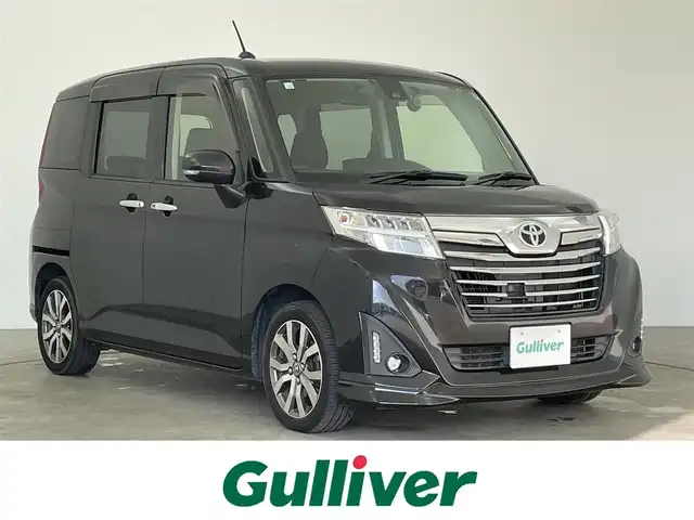 トヨタ ルーミー カスタムG－T 大分県 2018(平30)年 6.5万km ウォームグレーM/バーニッシュライトベージュM 純正ナビ（フルセグＴＶ／ＣＤ／ＤＶＤ／Ｂｌｕｅｔｏｏｔｈ）　/スマートアシスト　/両側パワースライド　/クルーズコントロール　/バックカメラ　/ステアリングスイッチ　/前ドラレコ　/アイドリングストップ　/ＥＴＣ/ワンオーナー