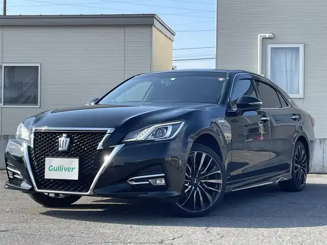 トヨタ クラウン ハイブリッド アスリートS Four 青森県 2016(平28)年 8.5万km ブラック ４WD/純正SDナビ/AM/FM/BT/SD/CD/DVD/AUX/フルセグ/横滑り防止装置/クルーズコントロール/クリアランスソナー/バックカメラ/ビルトインETC/ECOMODE/SNOWMODE/SPORTMODE/前席パワーシート/革巻きステアリング/ステアリングリモコン/MTモード付AT/プッシュスタート/スマートキー/LEDヘッドライト/オートライト/フォグランプ/電動格納ミラー/ウィンカーミラー/純正フロアマット/ドアバイザー/取説