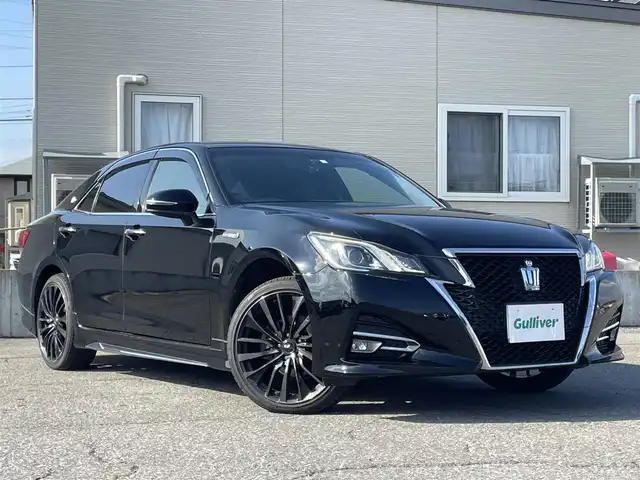 トヨタ クラウン ハイブリッド アスリートS Four 青森県 2016(平28)年 8.5万km ブラック ４WD/純正SDナビ/AM/FM/BT/SD/CD/DVD/AUX/フルセグ/横滑り防止装置/クルーズコントロール/クリアランスソナー/バックカメラ/ビルトインETC/ECOMODE/SNOWMODE/SPORTMODE/前席パワーシート/革巻きステアリング/ステアリングリモコン/MTモード付AT/プッシュスタート/スマートキー/LEDヘッドライト/オートライト/フォグランプ/電動格納ミラー/ウィンカーミラー/純正フロアマット/ドアバイザー/取説