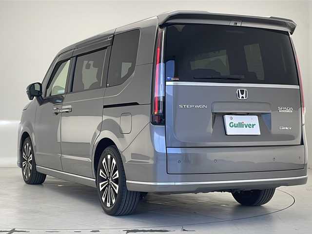 ホンダ ステップワゴン スパーダ eHEV プレミアムライン 沖縄県 2023(令5)年 3.1万km スーパープラチナグレーメタリック 純正ナビ　【LXM-237VFLi】/　(フルセグTV　Bluetooth　CD/DVD)/マルチビューカメラシステム　　/前後ドライブレコーダー　/両側パワースライドドア　/アダプティブクルーズコントロール　/ＬＥＤヘッドライト　/電動リアゲート　/ＥＴＣ/プッシュスタート/スマートキー/スペアキー/シートヒーター　