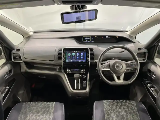 日産 セレナ ハイウェイスター G 愛知県 2017(平29)年 7.4万km ダイヤモンドブラック 純正９インチナビ/プロパイロット/アラウンドビューモニター/フリップダウンモニター/両側パワースライドドア/ハンズフリーオートスライドドア/衝突軽減ブレーキ/インテリジェントパーキングアシスト/車線逸脱警報/クリアランスソナー/電動パーキングブレーキ/ブレーキホールド/デジタルインナーミラー/ビルトインＥＴＣ/アイドリングストップ/シートカバー/純正フロアマット/純正16インチアルミホイール