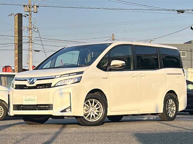 トヨタ ヴォクシー ハイブリッド V 愛知県 2018(平30)年 4.4万km ホワイトパールクリスタルシャイン /禁煙/ワンオーナー//ディーラー整備記録簿H31.R1.2.3.4.5.6//ALPINE9型ナビ/フルセグ/CD/DVD/SD/MSV/BT//バックカメラ/ETC/純正ドラレコ//ALPINE10型フリップダウンモニター//革巻きステア/ステアスイッチ//リアロールサンシェード/シートバックテーブル//両側パワースライドドア//LEDオートライト/オートハイビーム/LEDフォグ//PCS/LDA//クルーズコントロール//前席シートヒーター//オートリトラウインカーミラー//照明付きバニティミラー//プッシュスタート/スマートキー//新車時保証書//取扱説明書//ドラレコ取説//スペアスマートキー