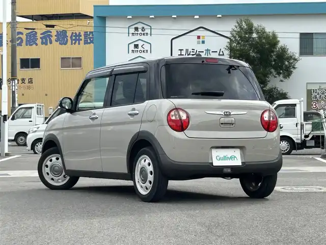 スズキ ラパン ＬＣ X 愛媛県 2022(令4)年 2.4万km フォーンベージュメタリック/アーバンブラウン 2トーン 純正ディスプレイオーディオ/BT/AM・FM/Apple CarPlay・Android Auto/ETC/ステアリングスイッチ/USBポート/D席+N席シートヒーター/アイドリングストップ/レーンキープアシスト/パーキングアシスト/衝突軽減システム/横滑り防止装置/LEDヘッドライト/純正フロアマット/純正アルミホイール