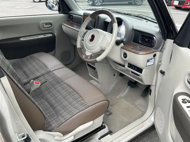 スズキ ラパン ＬＣ X 愛媛県 2022(令4)年 2.4万km フォーンベージュメタリック/アーバンブラウン 2トーン 純正ディスプレイオーディオ/BT/AM・FM/Apple CarPlay・Android Auto/ETC/ステアリングスイッチ/USBポート/D席+N席シートヒーター/アイドリングストップ/レーンキープアシスト/パーキングアシスト/衝突軽減システム/横滑り防止装置/LEDヘッドライト/純正フロアマット/純正アルミホイール