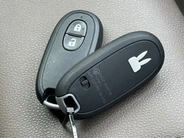 スズキ ラパン ＬＣ X 愛媛県 2022(令4)年 2.4万km フォーンベージュメタリック/アーバンブラウン 2トーン 純正ディスプレイオーディオ/BT/AM・FM/Apple CarPlay・Android Auto/ETC/ステアリングスイッチ/USBポート/D席+N席シートヒーター/アイドリングストップ/レーンキープアシスト/パーキングアシスト/衝突軽減システム/横滑り防止装置/LEDヘッドライト/純正フロアマット/純正アルミホイール